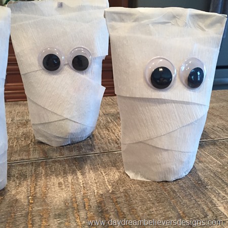 Easy to DIY Mummy juice pouches. So cute for Halloween lunch!