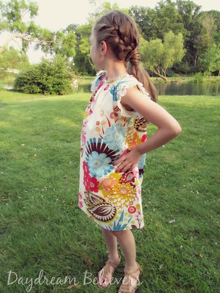 I don't know what I love more, the dainty lace details or the gorgeous floral print. Swoon!