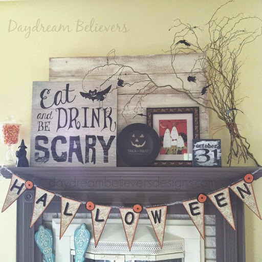 Halloween Mantle with Framed Art and fresh twigs
